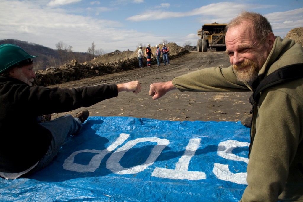 James McGuinness and Mike Roselle of Climate Ground Zero were arrested today, February 25, 2009, on Performance Coal's Edwight Mountaintop Removal site in southern West Virginia. The protesters chose to focus on the active mountaintop removal site above Marsh Fork Elementary School in Sundial, WV  on the eve of the 37th year annivesary of the Buffalo Creek Disaster.